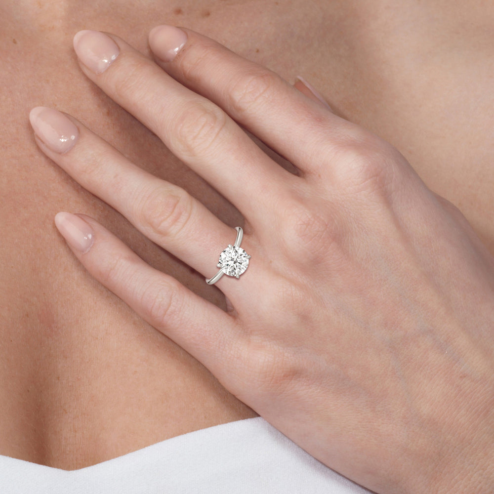 Model Wearing The W Classic Engagement Ring view