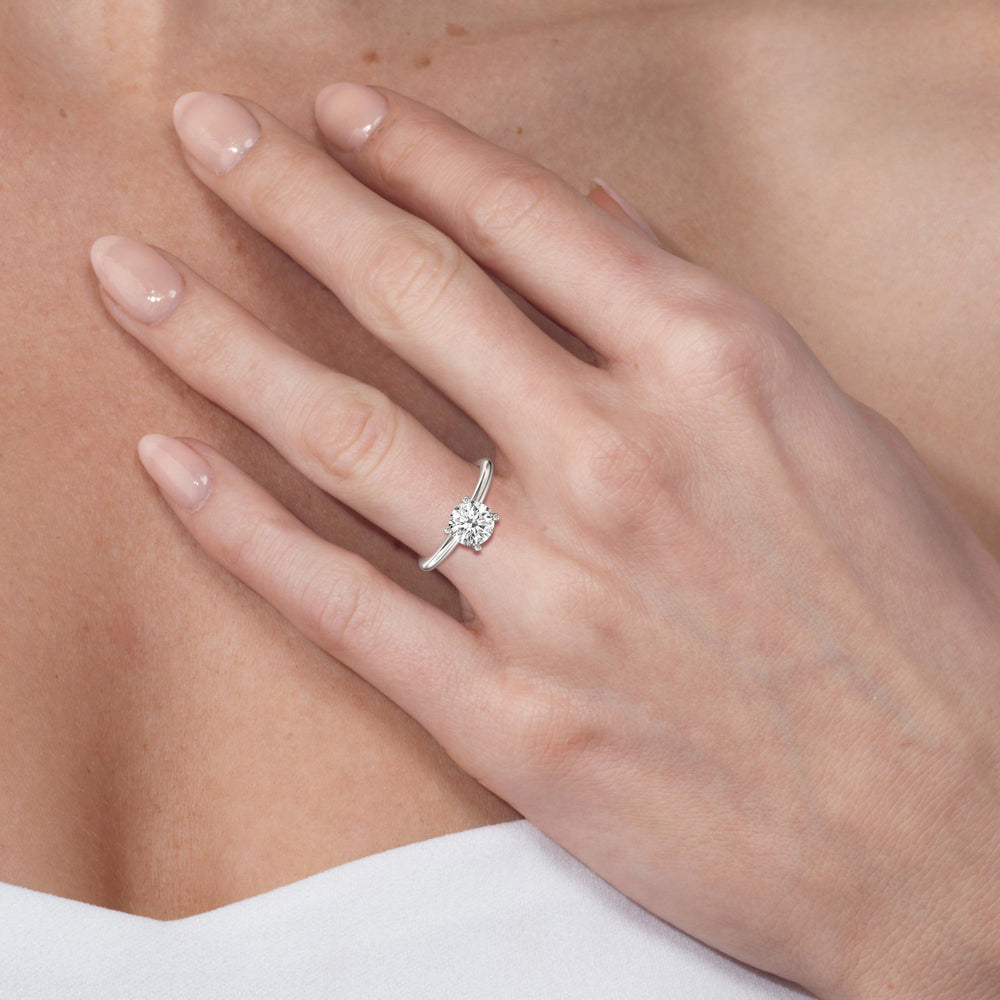 Model Wearing Classic Four Prong Solitaire Diamond Engagement Ring with Lab Grown Diamond view