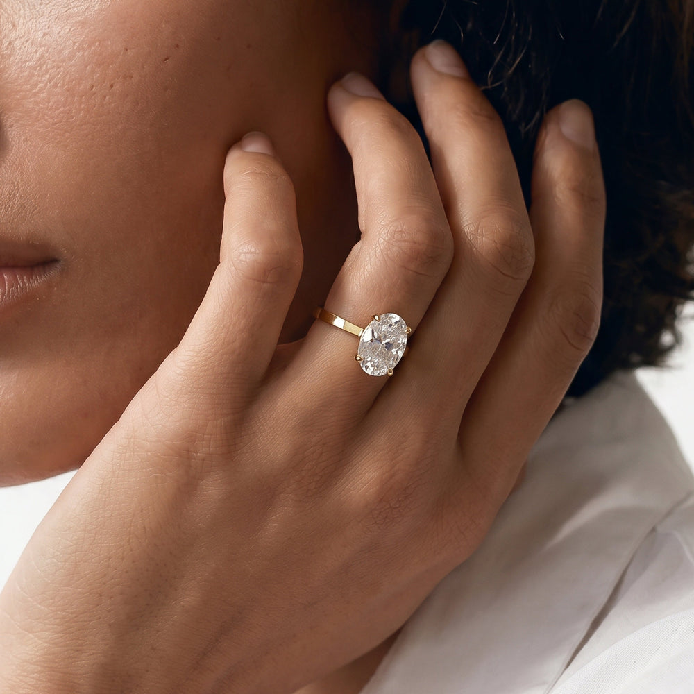 Oval Cut Petite Solitaire Diamond Engagement Ring with Lab Grown Diamond in 14KT Yellow Gold view 3
