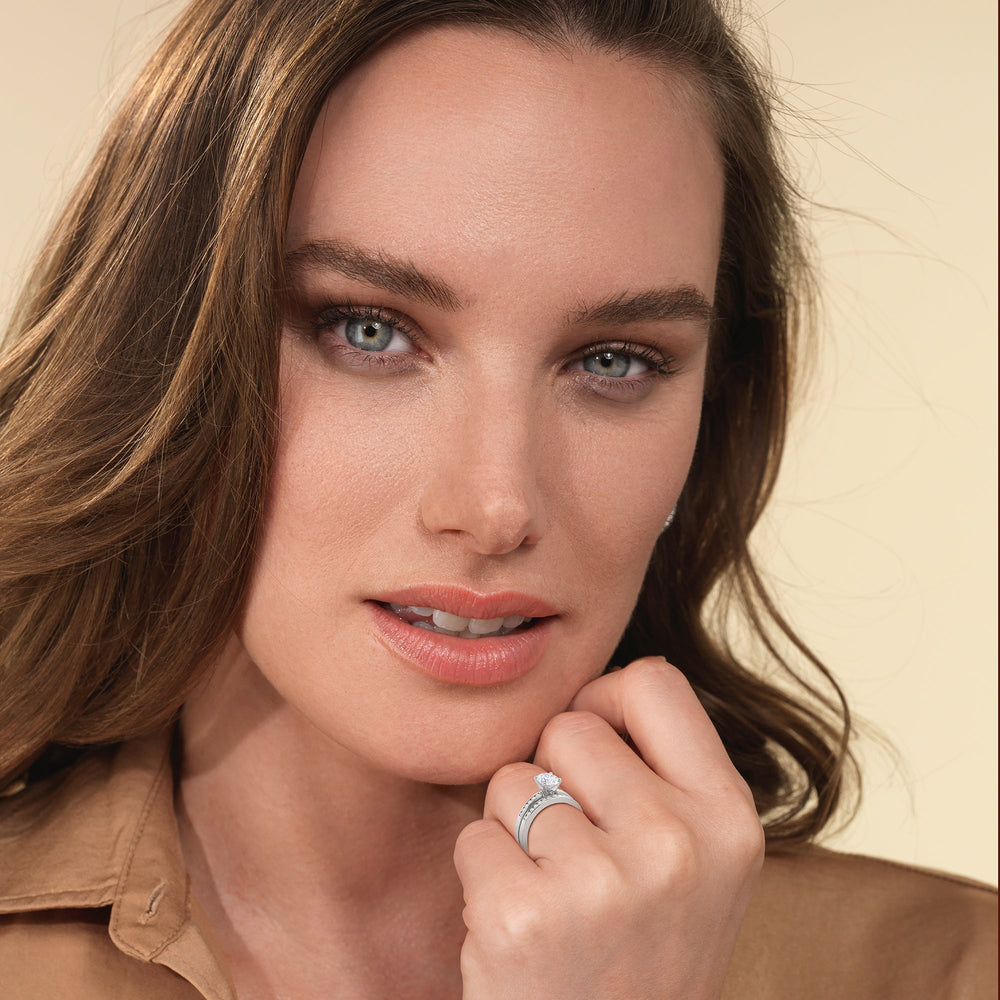 Model Wearing Cascading Channel Set Diamond Wedding Band view