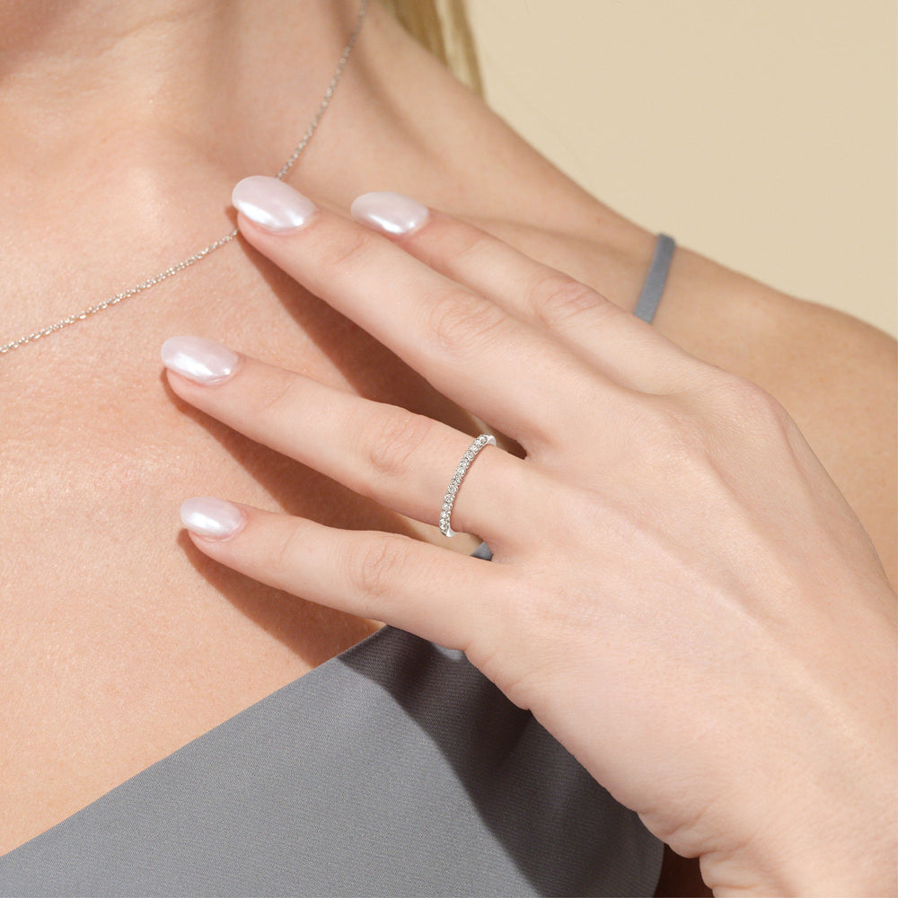 Model Wearing Shared Prong Diamond Wedding Band view