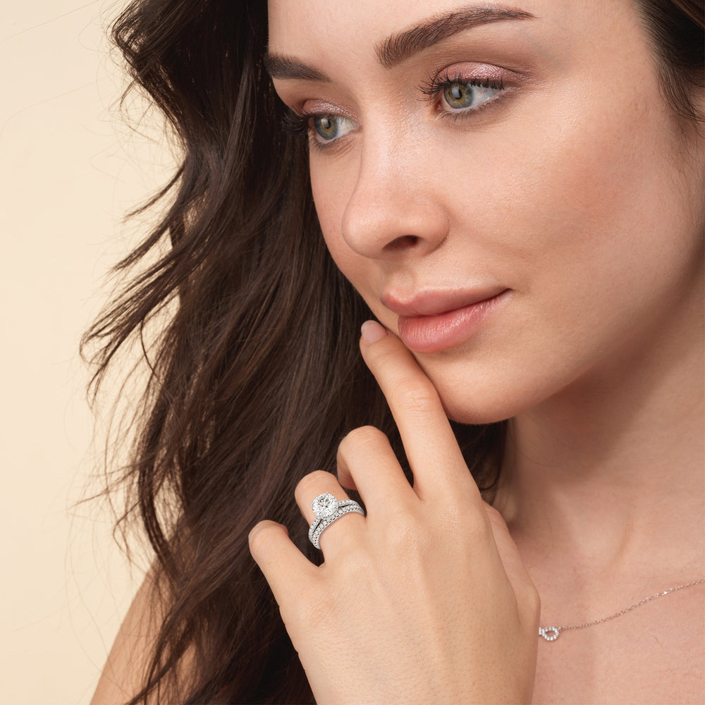Model Wearing Scalloped Hidden Halo with Studded Gallery Diamond Wedding Band view