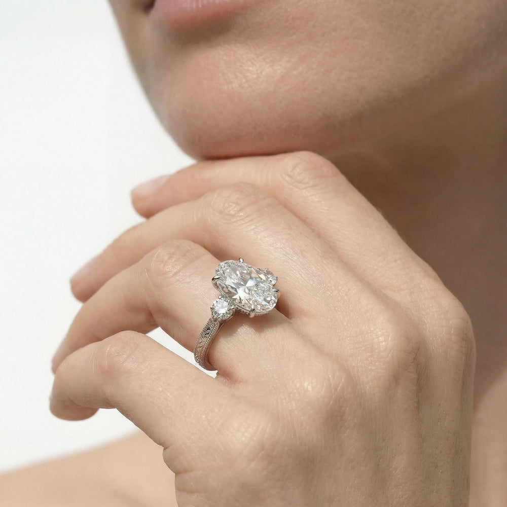 The Seraphine Round Three Stone Ring with Oval Cut Diamond in 14KT Yellow Gold view 3
