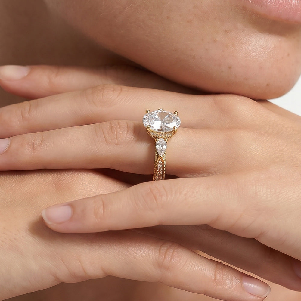 The Chrysler Pear Three Stone Ring with Round Cut Diamond in 14KT White & Yellow Gold view 3
