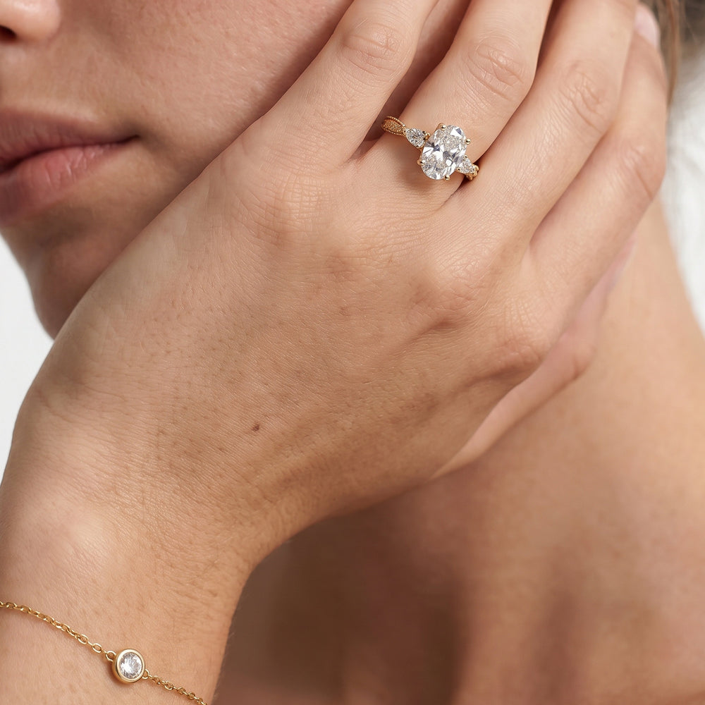 The Chrysler Pear Three Stone Ring with Round Cut Diamond in 14KT White & Rose Gold view 4

