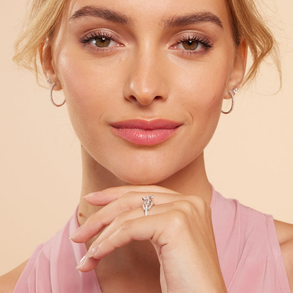 Model Wearing Side Stone Bridge Accent Engagement Ring view