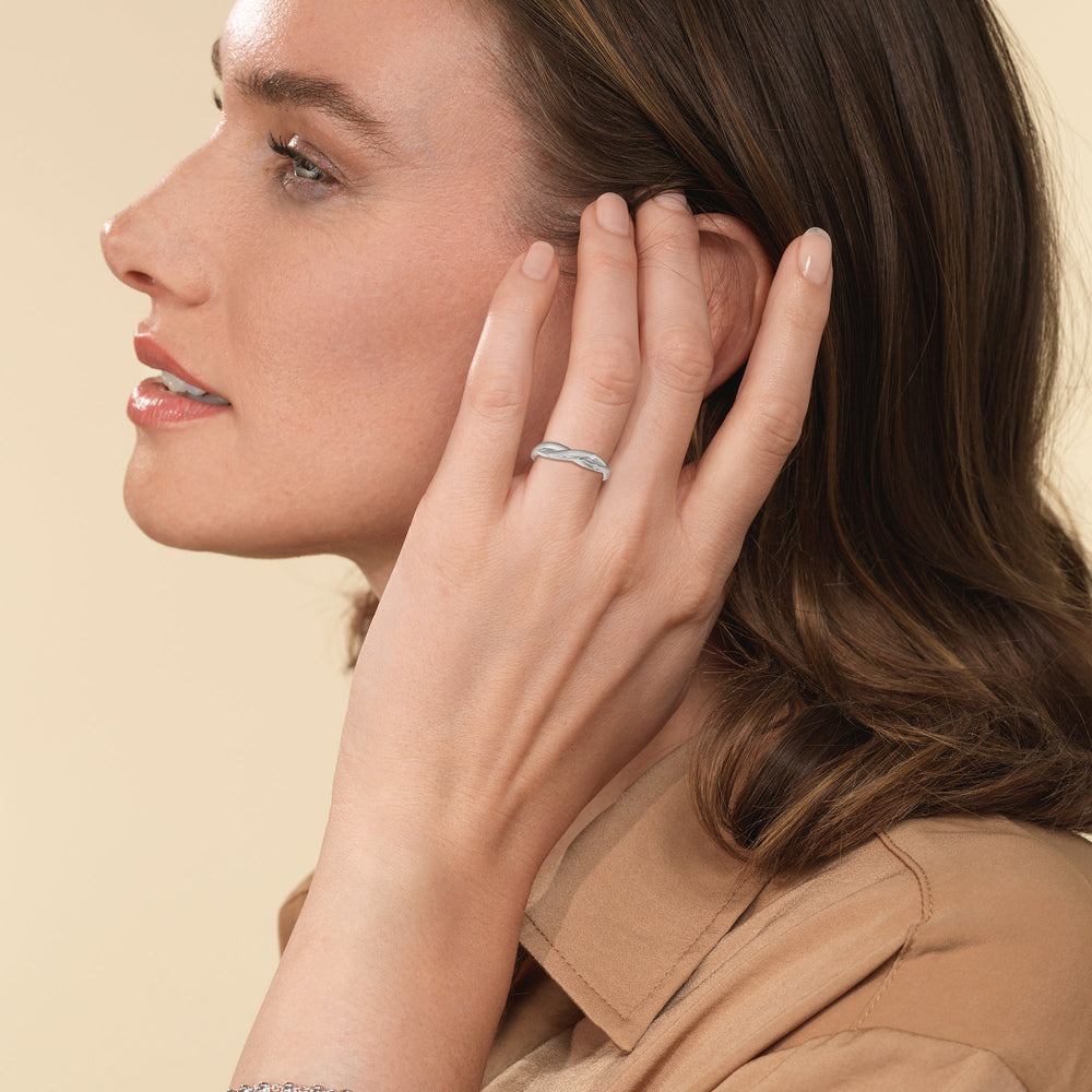 Model Wearing Twisting Solitaire Wedding Band view