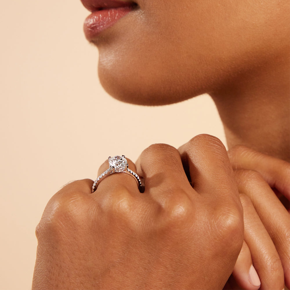 Model Wearing Channel Set Hidden Halo Engagement Ring with Lab Grown Diamond view