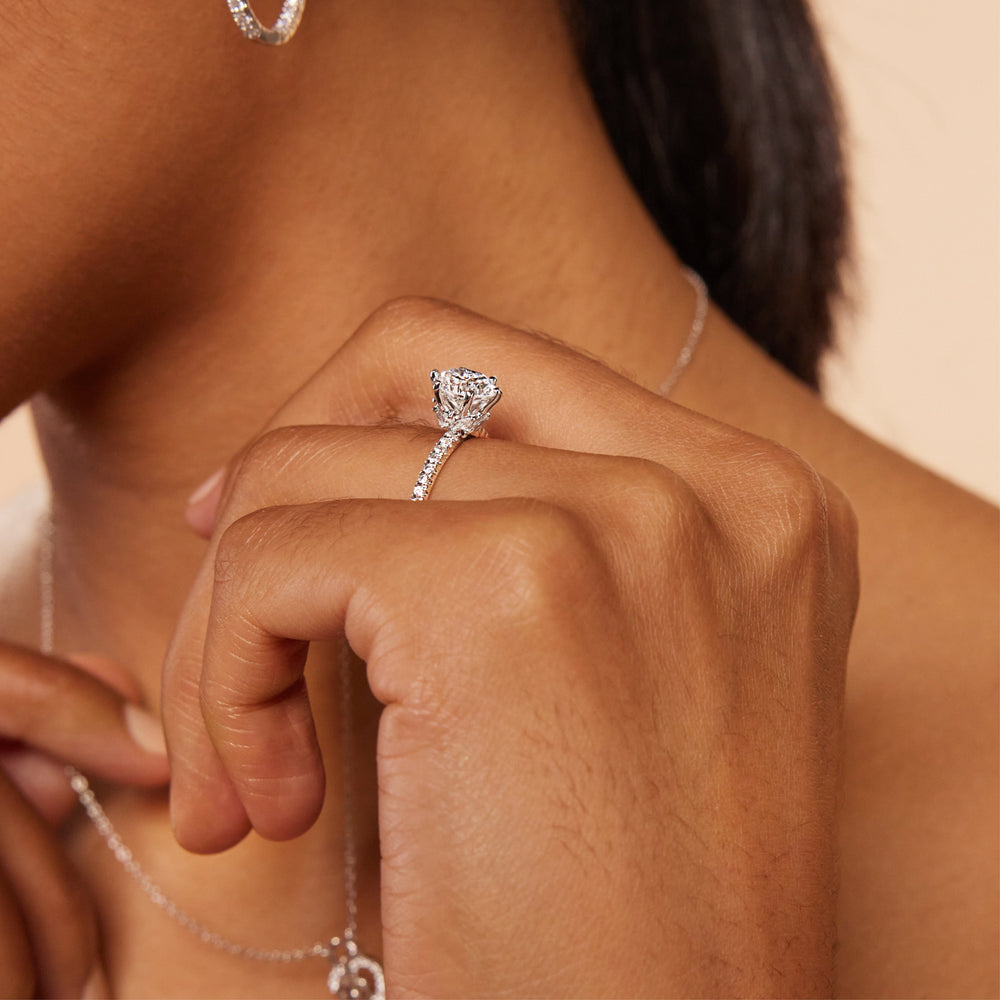 Model Wearing Marquise Hidden Halo Engagement Ring with Lab Grown Diamond view