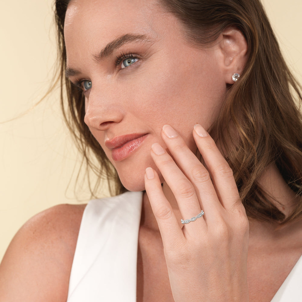 Model Wearing Something Blue Gerbera Under Halo Diamond Wedding Band view