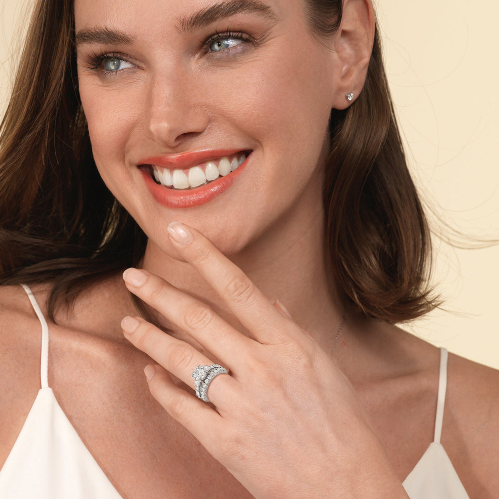Model Wearing Emerald and Round Side Stone Diamond Wedding Band view