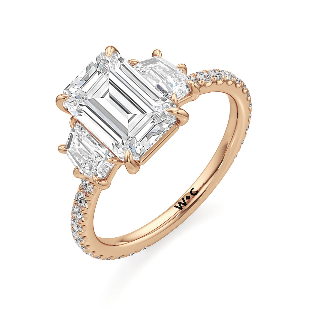The Scarlett Three Stone Engagement Ring with Emerald Cut Diamond in 14KT Rose Gold view 3
