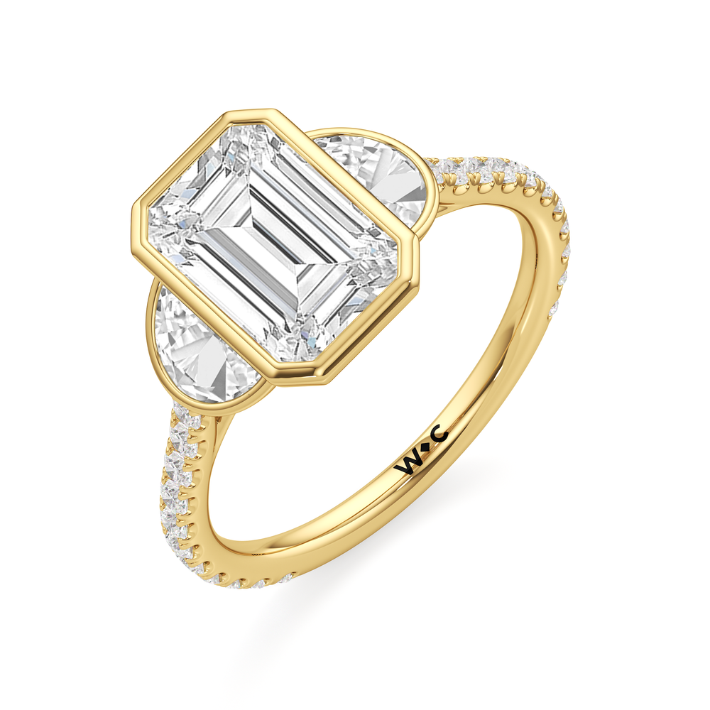 The Olivia Three Stone Engagement Ring with Emerald Cut Diamond in 14KT Yellow Gold view 3
