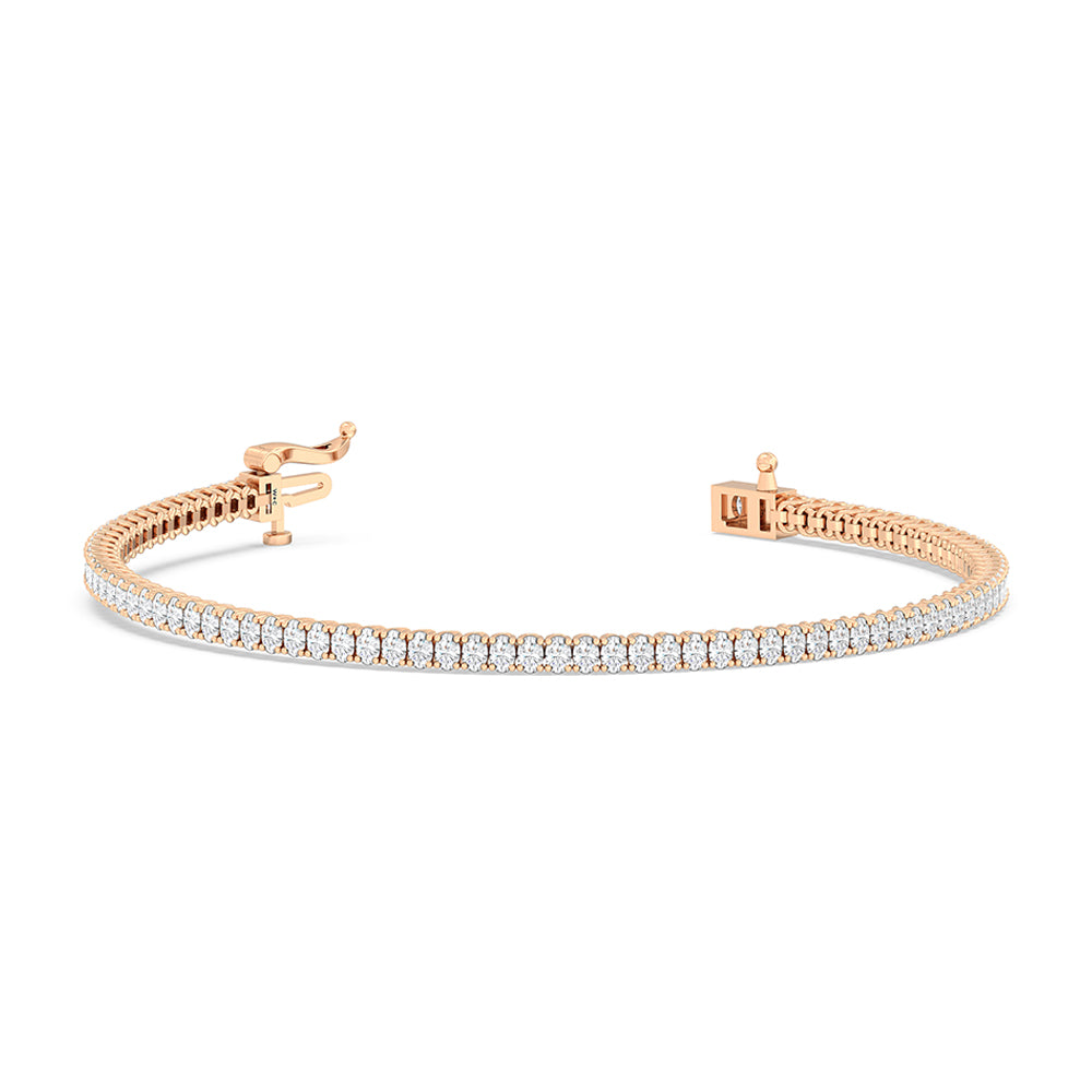 Oval Tennis Bracelet with 3 Cut Diamond in 14KT Rose Gold view 2
