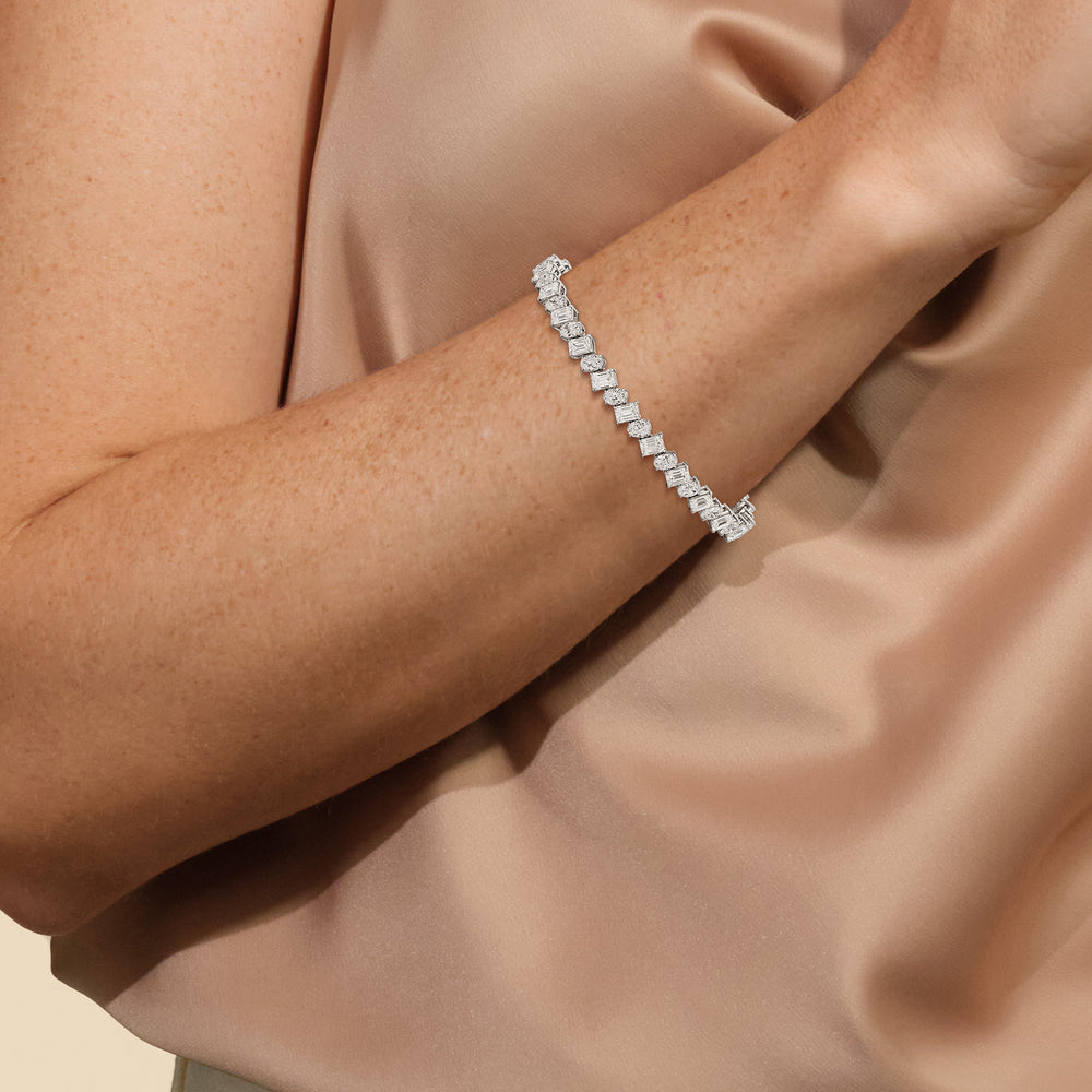 Model Wearing Angled Emerald and Oval Tennis Bracelet view