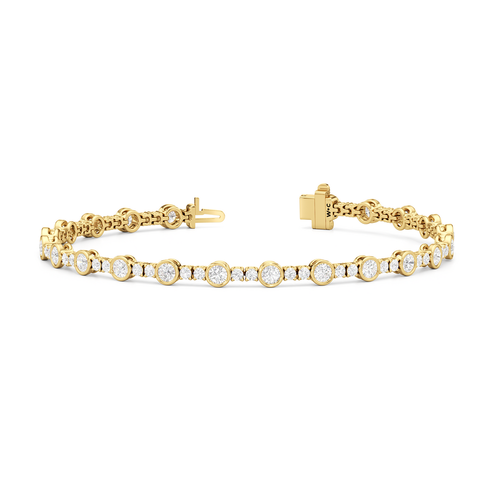Stationed Round Bezel Set Tennis Bracelet with 3 Cut Diamond in 14KT Yellow Gold view 2
