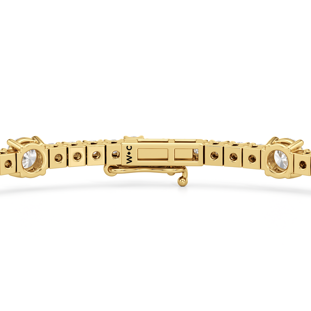 Round Station Tennis Bracelet with 2 3/4 Cut Diamond in 14KT Yellow Gold view 7
