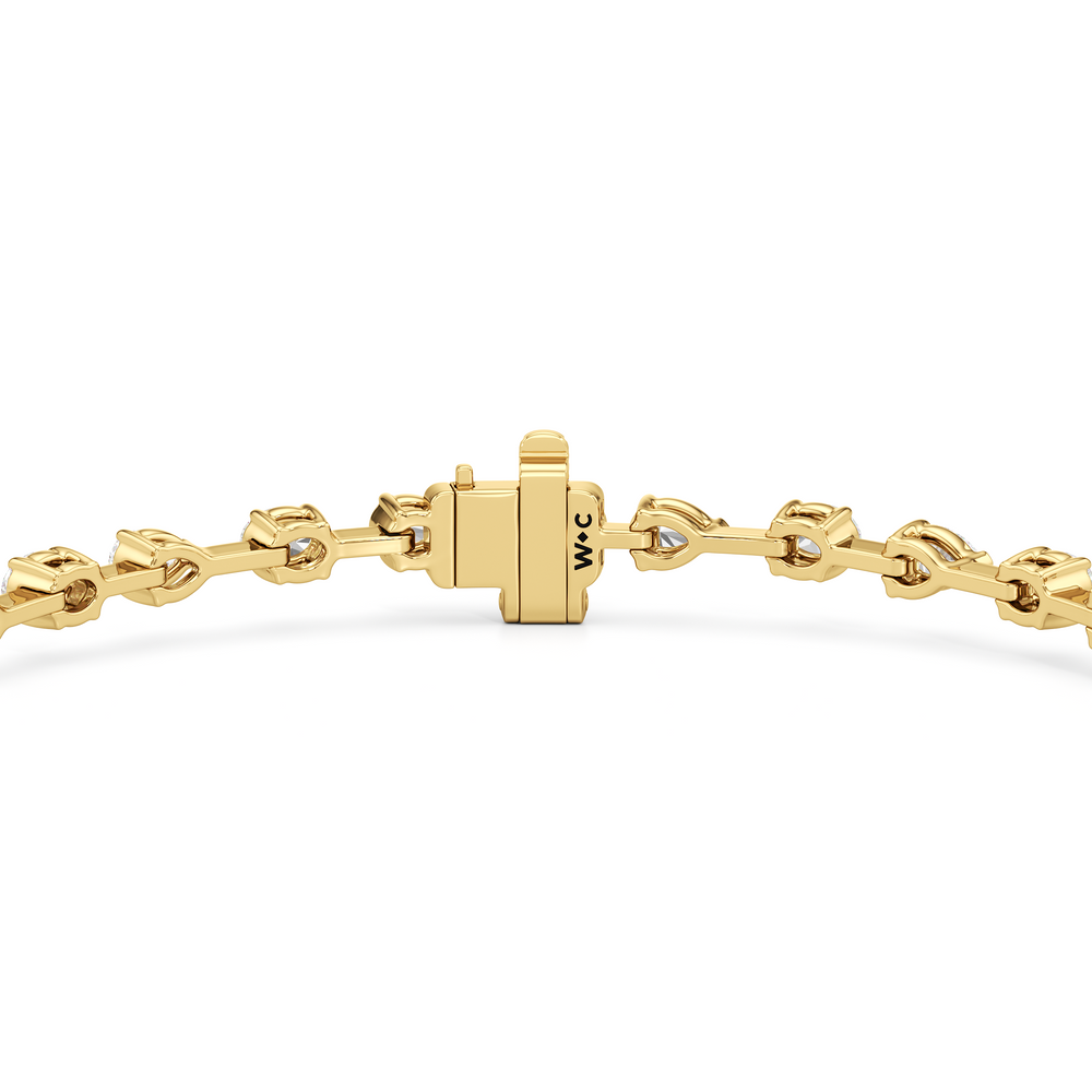Pear and Oval Tennis Bracelet with 2 1/2 Cut Diamond in 14KT Yellow Gold view 7
