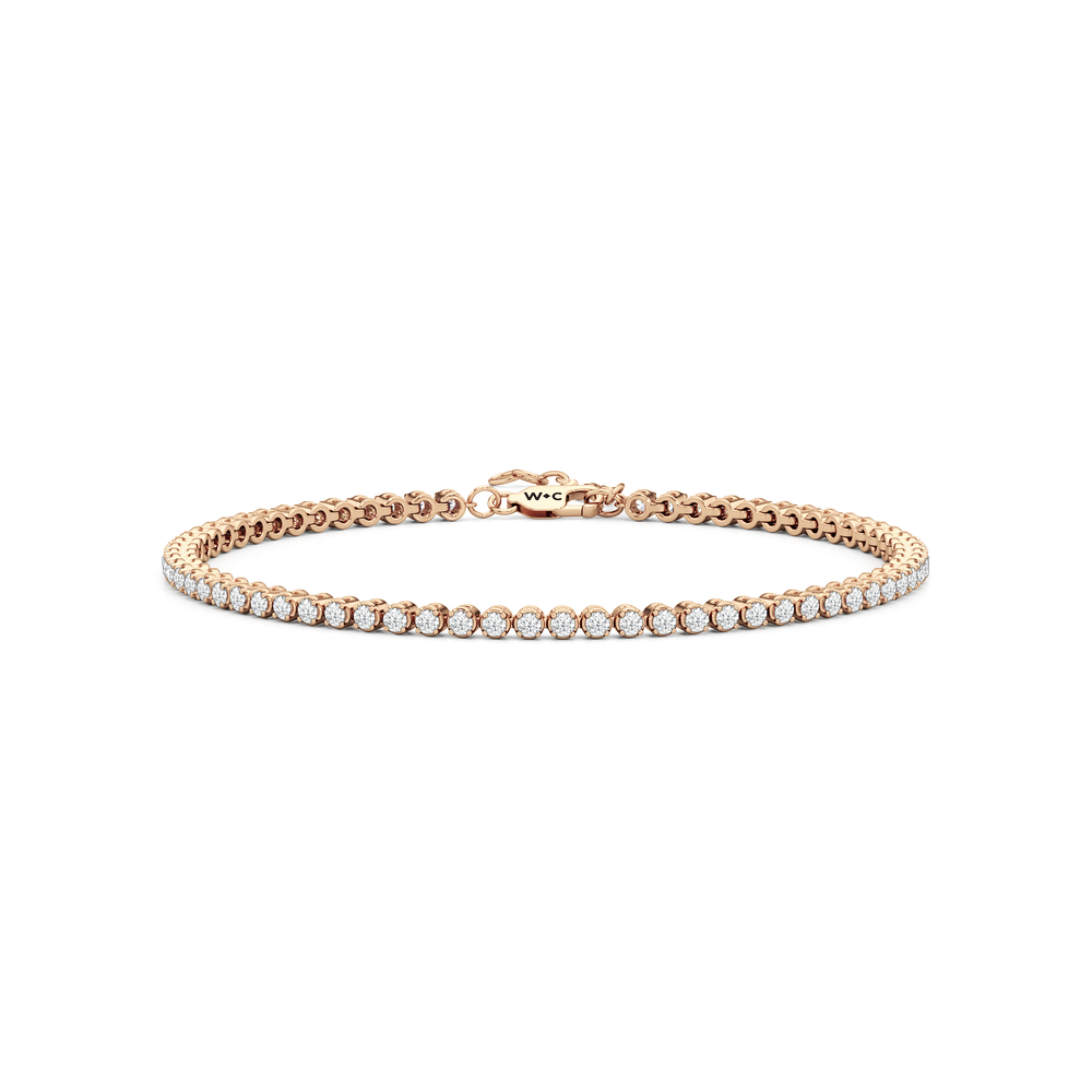 Petite Diamond Tennis Bracelet with 1 Cut Diamond in 14KT Rose Gold view 1

