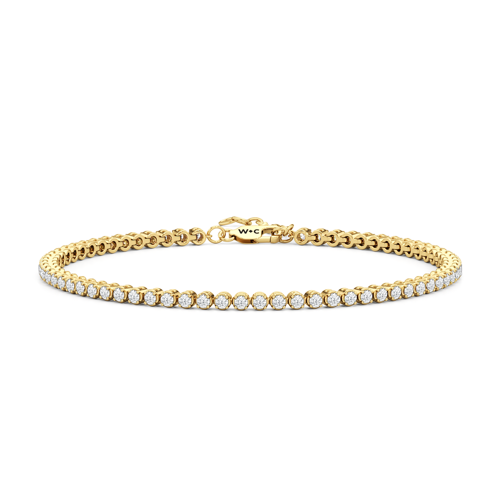 Petite Diamond Tennis Bracelet with 1 Cut Diamond in 14KT Yellow Gold view 1
