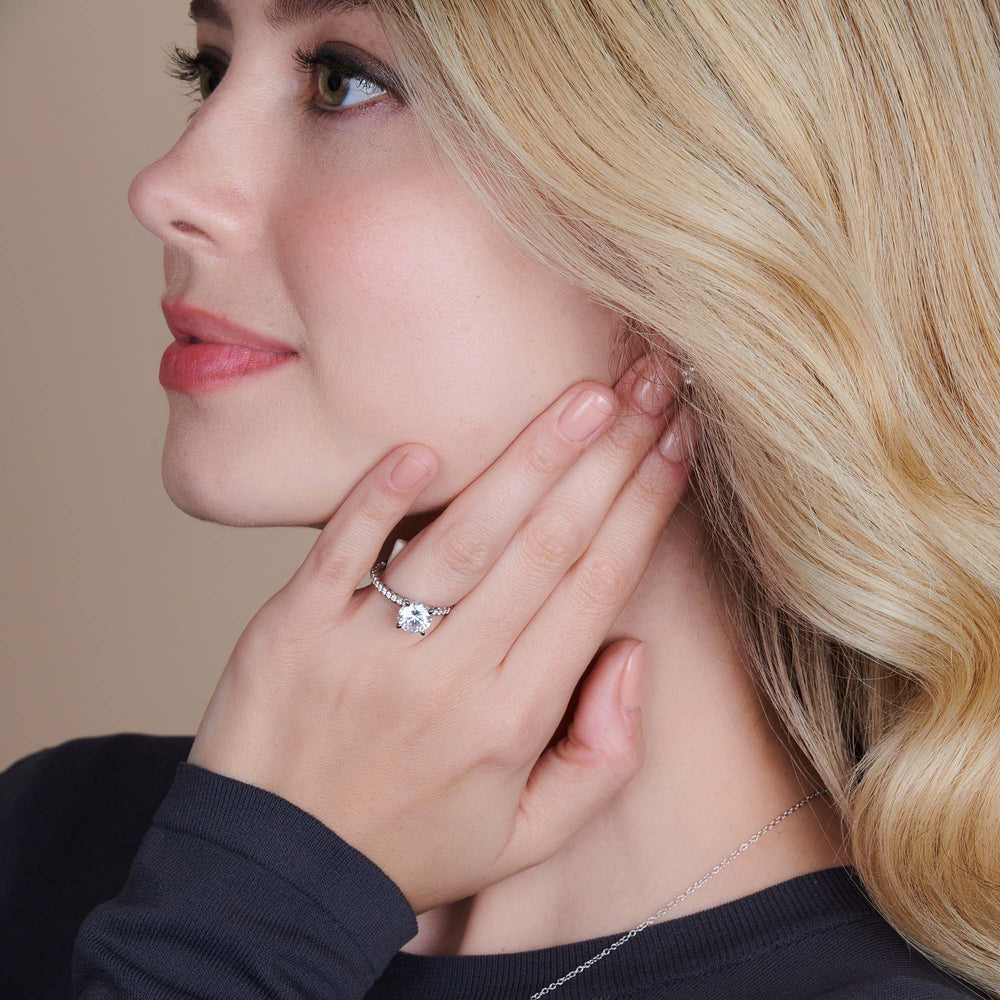 Model Wearing Coil Accent Diamond Engagement Ring with Lab Grown Diamond view