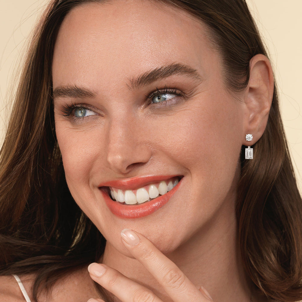 Model Wearing Toi Et Moi Round and Emerald Front Back Earrings view