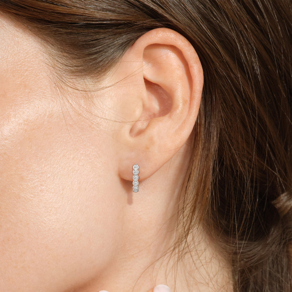 Muse Huggie Hoops with 14KT White Gold / Lab / 1/4 Cut Diamond in 14KT White Gold / Lab / 1/4 view 4
