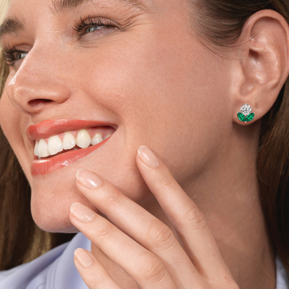 Model Wearing Classic Kite Set Round Diamond And Marquise Created Emerald Earring view