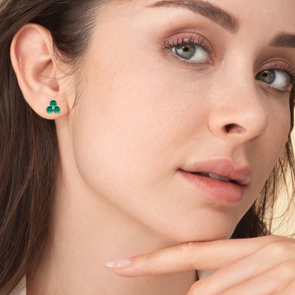 Model Wearing Emerald Classic Three Stone Cluster EarringsTest Drashya view