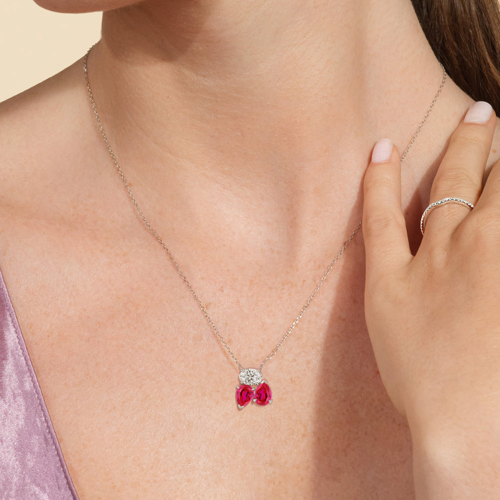 Model Wearing Ruby And Diamond Mixed Shape Cluster Necklace view