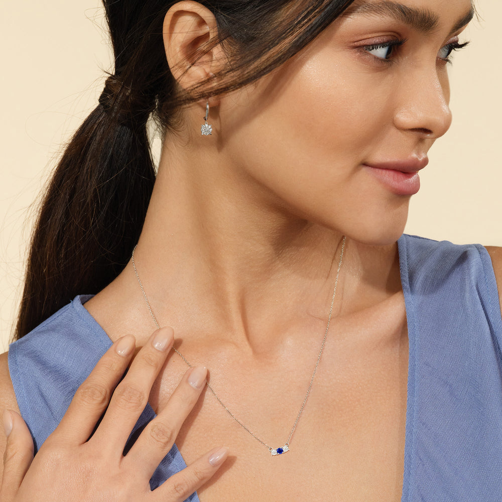 Model Wearing Sapphire and Diamond Dainty Three Stone Necklace view