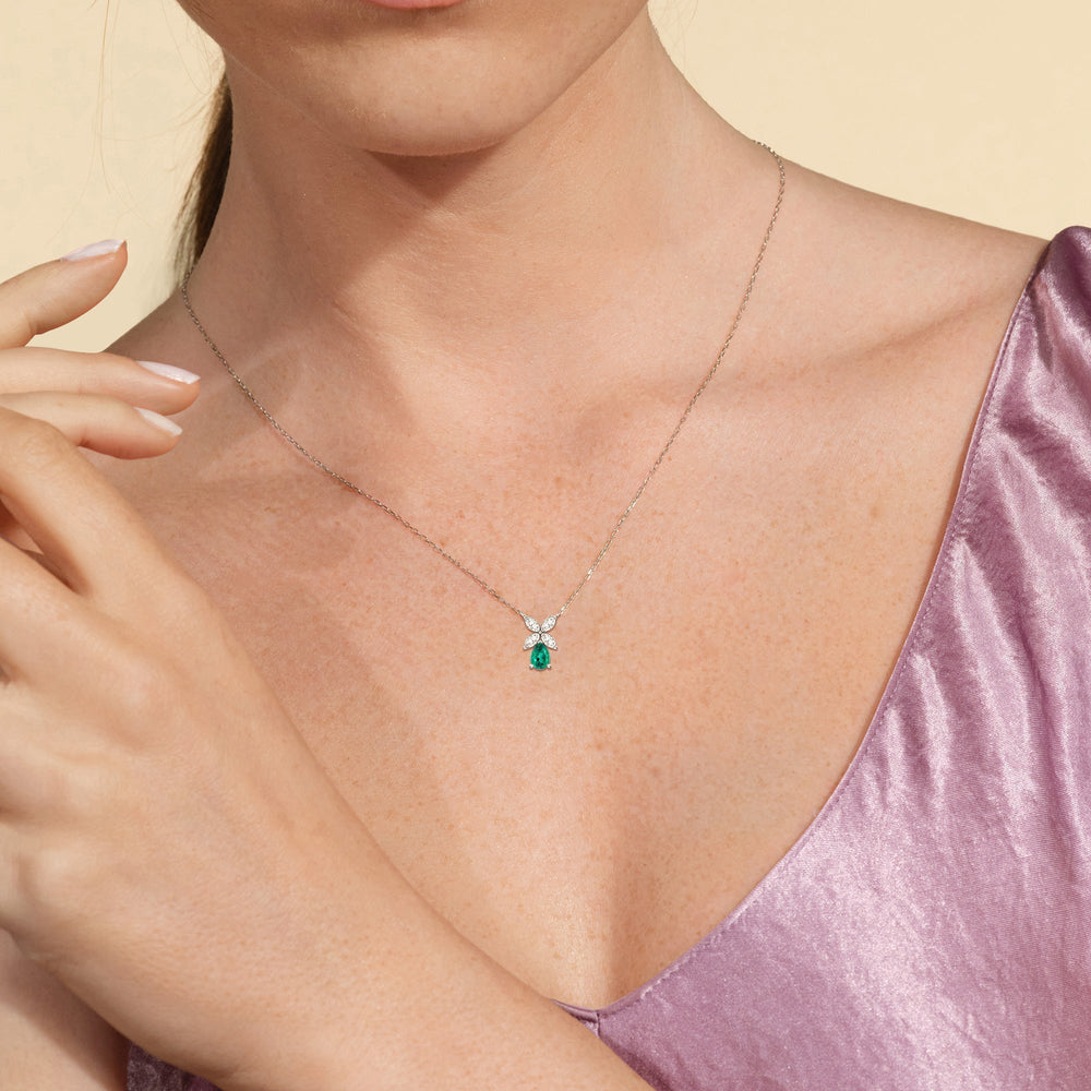 Model Wearing Emerald and Diamond Tulip Drop Necklace view