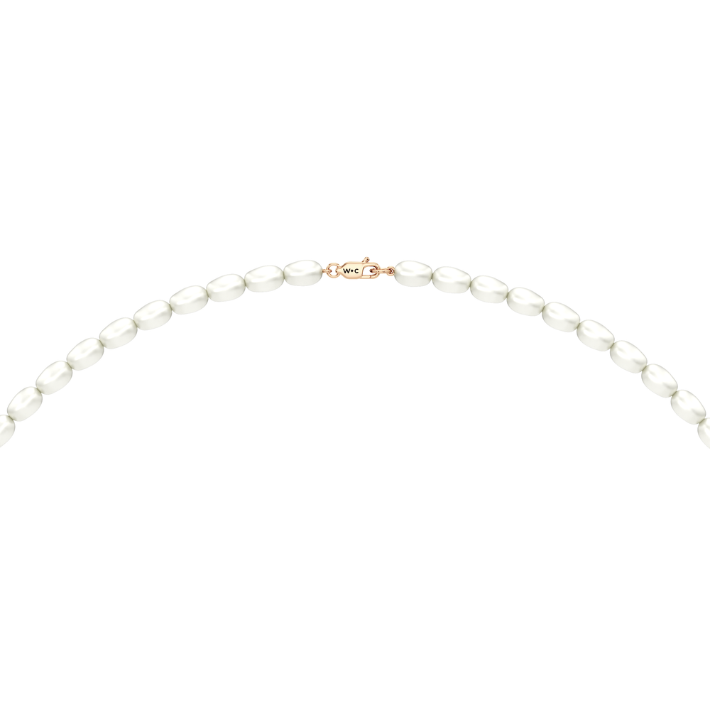 A strand of oval pearls designed to sit neatly around the neckline. A modern take on the classic pearl necklace that can be worn alone or paired with other necklaces. with 14KT Rose Gold Cut Diamond in 14KT Rose Gold view 6

