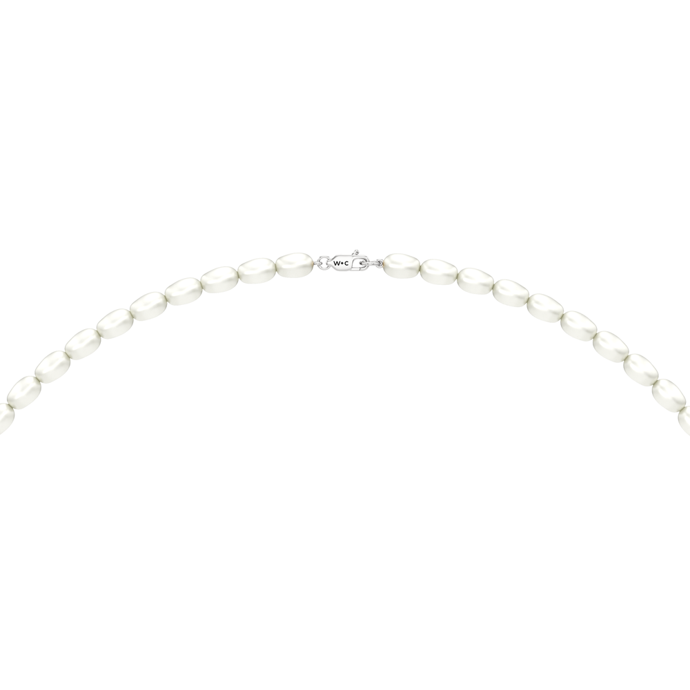 A strand of oval pearls designed to sit neatly around the neckline. A modern take on the classic pearl necklace that can be worn alone or paired with other necklaces. with 14KT White Gold Cut Diamond in 14KT White Gold view 6
