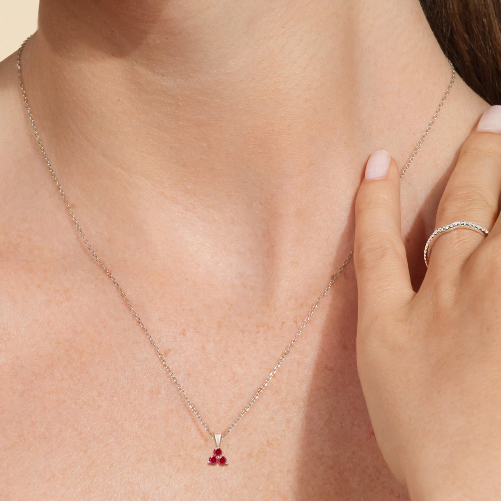 Model Wearing Ruby Three Stone Cluster Pendant view