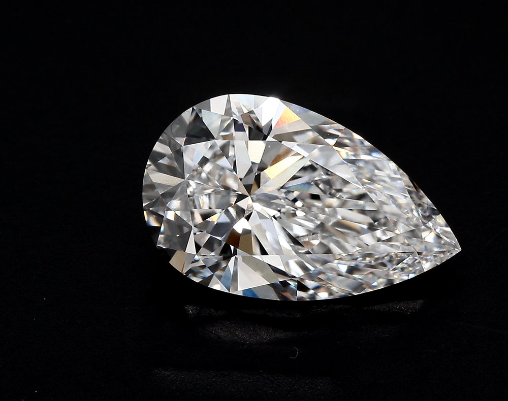 1.51 Carat Pear Lab Diamond with  Cut Diamond in 14KT  view 1
