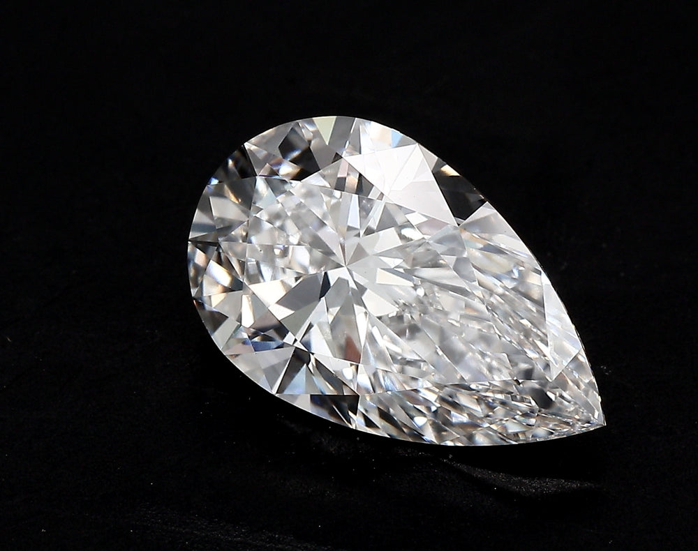 1.51 Carat Pear Lab Diamond with  Cut Diamond in 14KT  view 1
