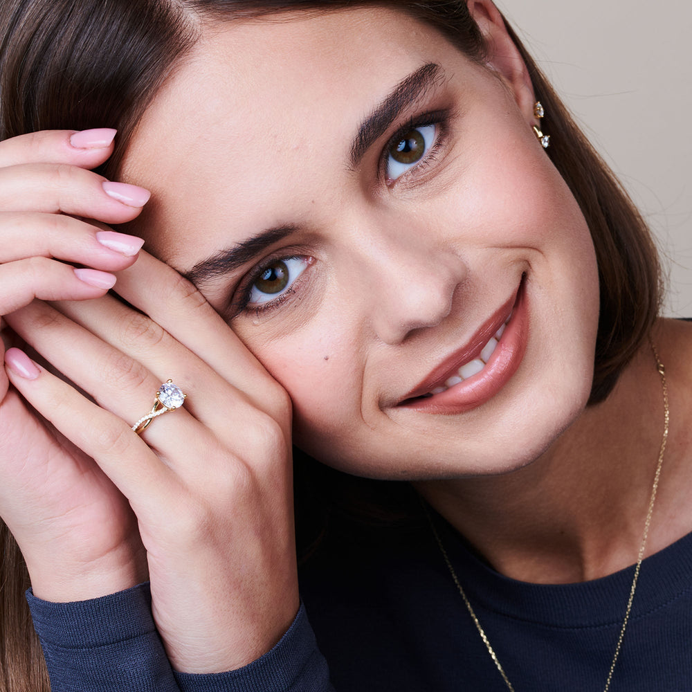 Model Wearing Vintage Glamour Ribbon Swirl Engagement Ring (E+ VVS+) with Lab Grown Diamond view