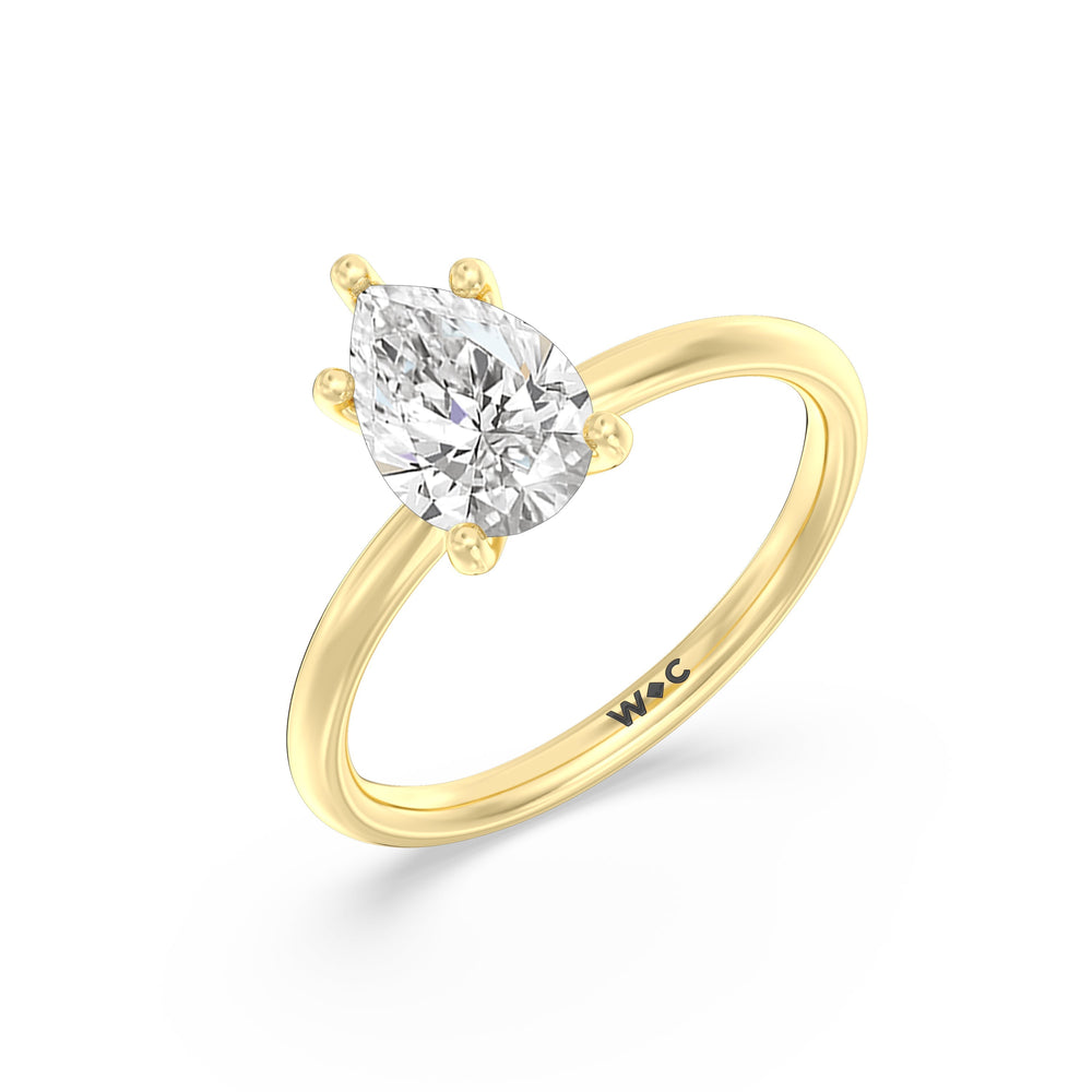 Pear Cut Classic Four Prong Solitaire Diamond Engagement Ring with Lab Grown Diamond in 14KT Yellow Gold view 4

