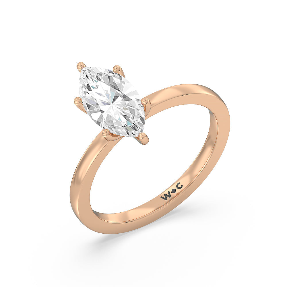 Petite Solitaire Diamond Engagement Ring with Marquise Cut Diamond in 14KT Rose Gold view 3

