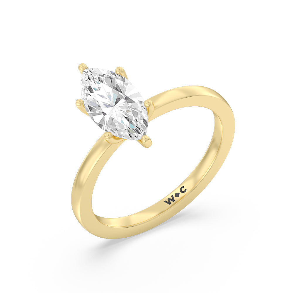 Petite Solitaire Diamond Engagement Ring with Marquise Cut Diamond in 14KT Yellow Gold view 3
