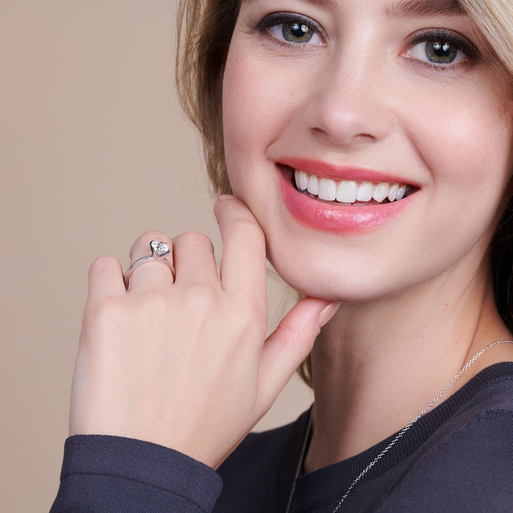 Model Wearing Fine Petite Solitaire Diamond Engagement Ring view