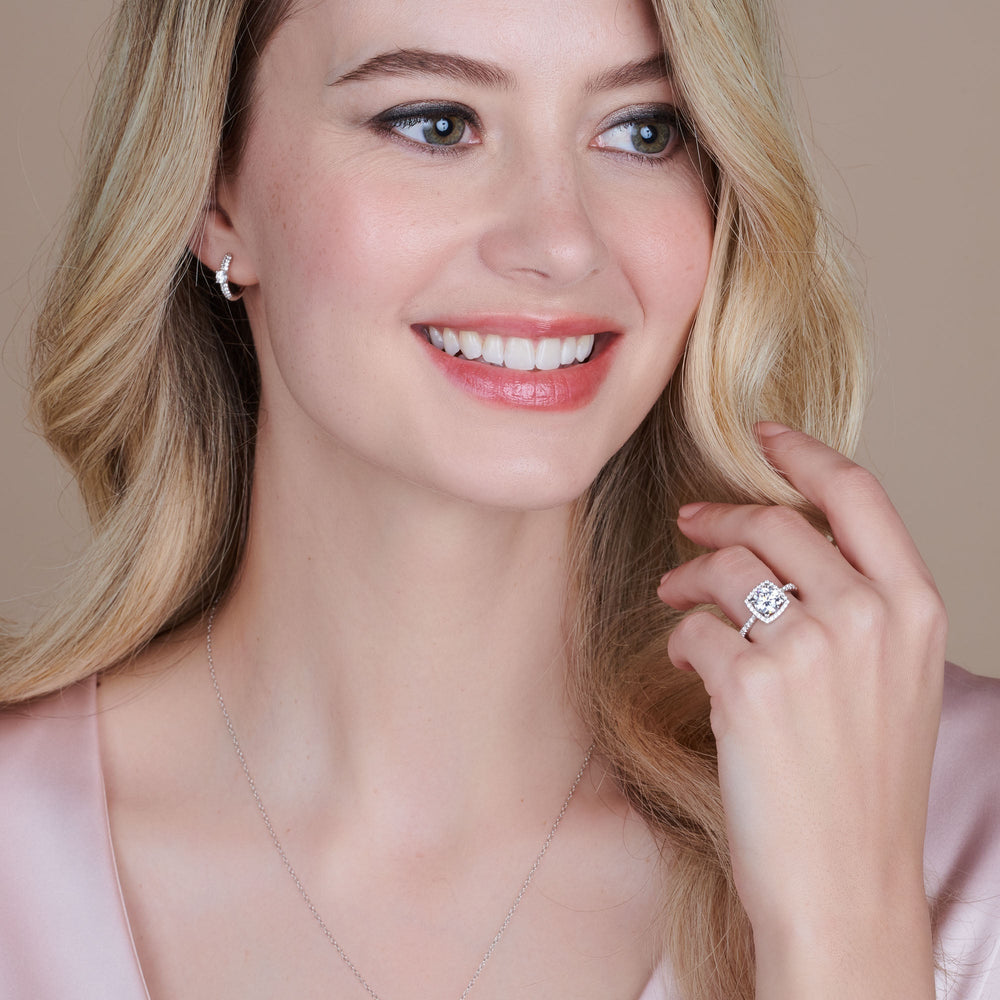 Model Wearing Tapered Cushion Halo Engagement Ring with Lab Grown Diamond view