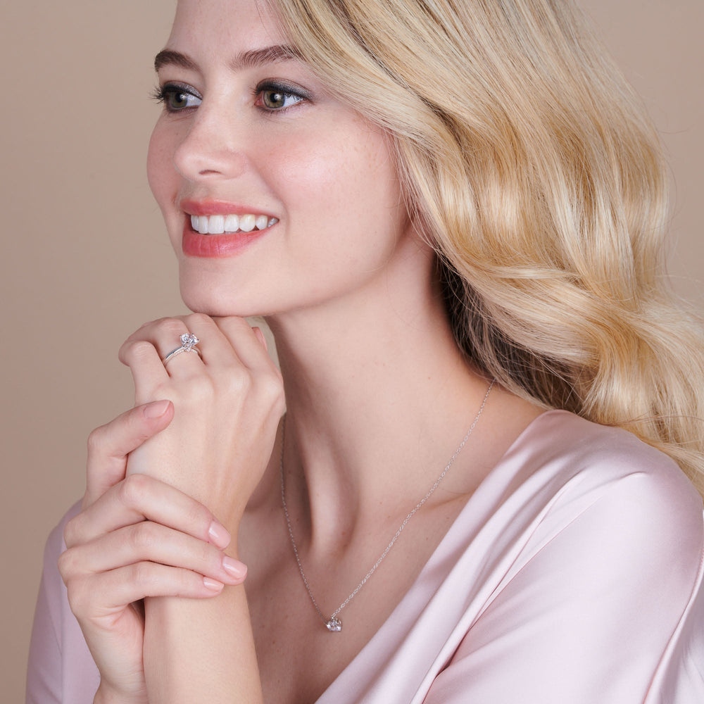 Model Wearing Adorned Hidden Accent Diamond Engagement Ring view