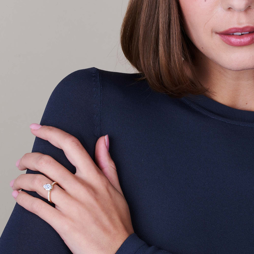 Model Wearing Arc Hidden Halo Engagement Ring  (E+ VVS+) with Lab Grown Diamond view