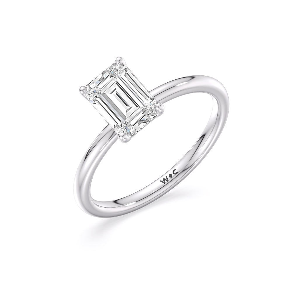Classic Four Prong Petite Comfort Fit Solitaire Engagement Ring with Emerald Cut Diamond in 14KT Platinum view 4
