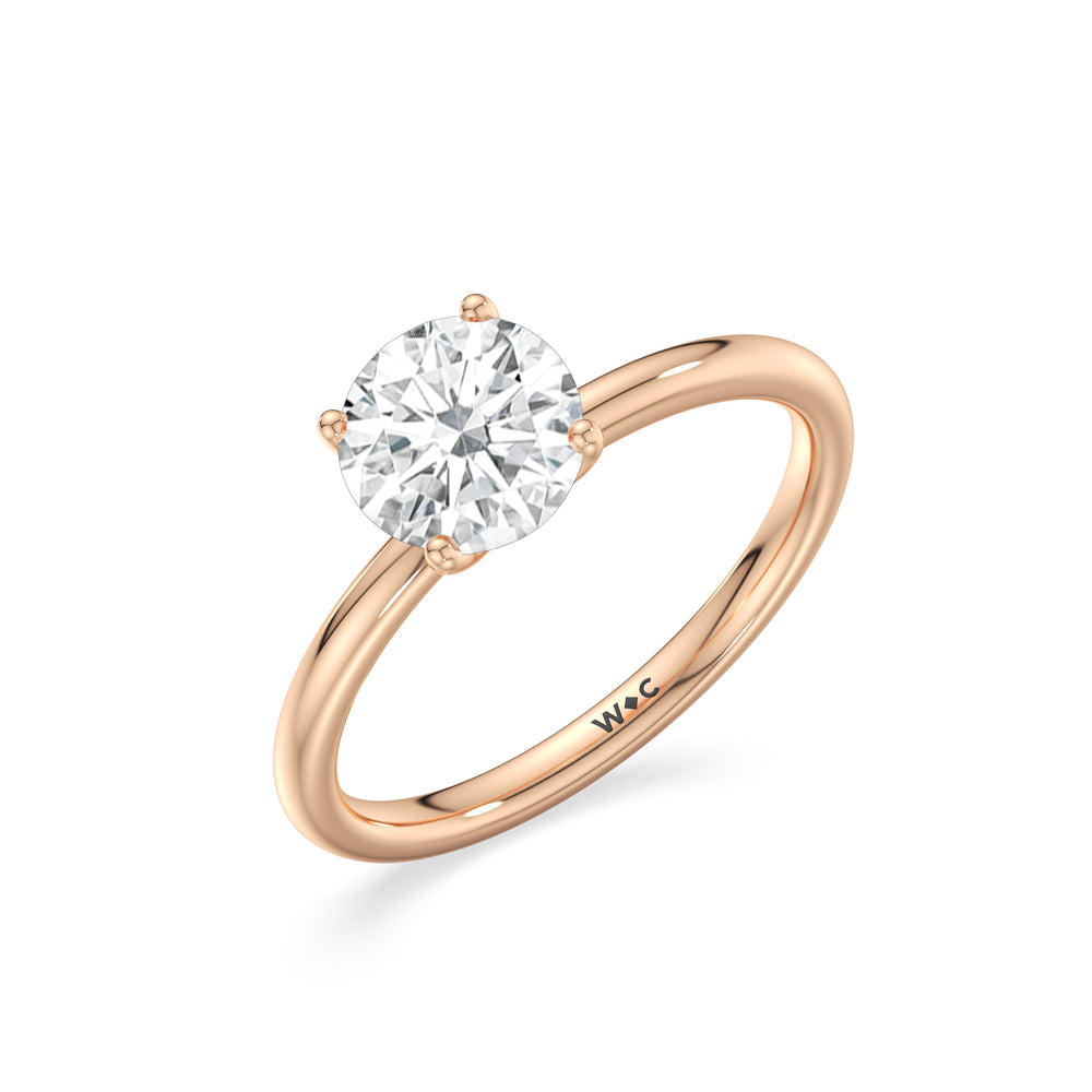 Classic Four Prong Petite Comfort Fit Solitaire Engagement Ring with Round Cut Diamond in 14KT Rose Gold view 4
