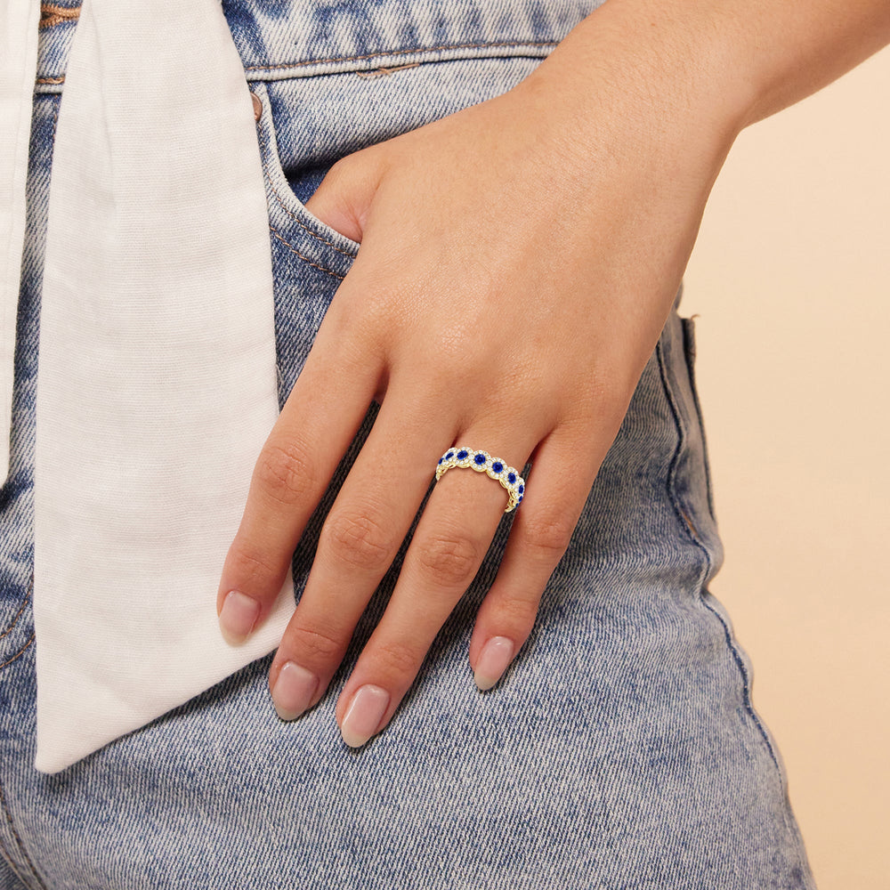 Model Wearing Created Sapphire Round Halo Eternity Ring view