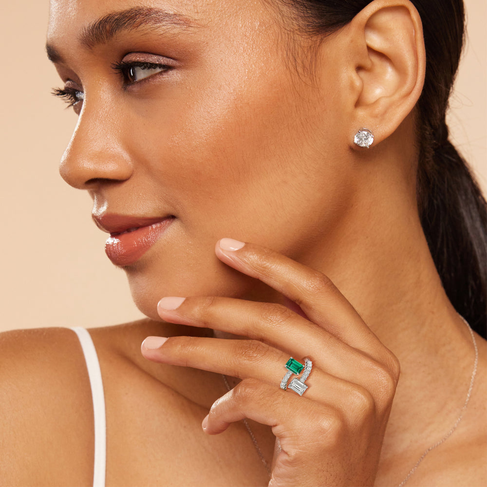 Model Wearing Toi Et Moi Bypass Created Emerald and Emerald Shape Studded Engagement Ring view