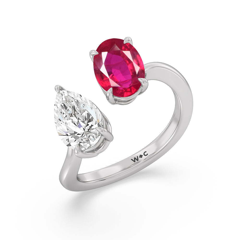 Toi Et Moi Created Ruby Oval and Pear Diamond Curved Engagement Ring with 14KT White Gold Cut Diamond in 14KT White Gold view 2

